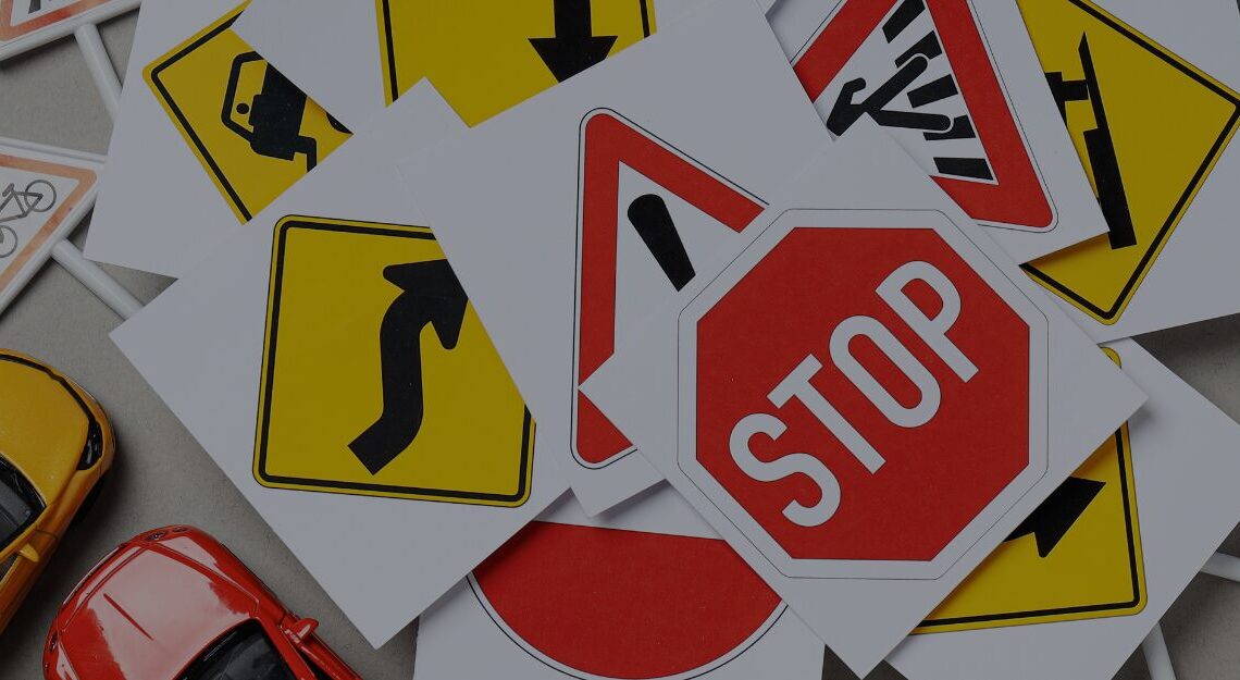 traffic signs printed out on table